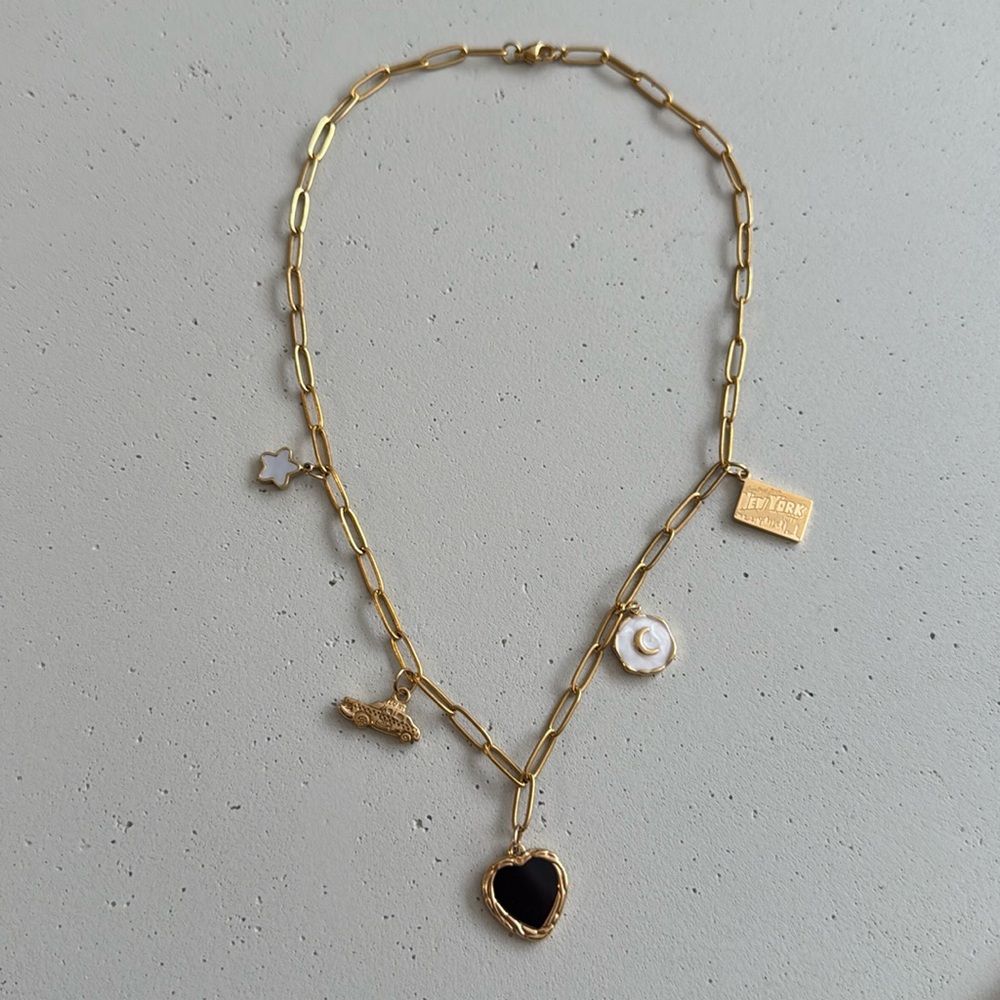 Custom charm necklace by Gabriela Ceballos.